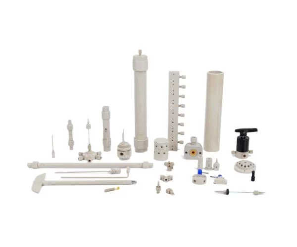 peek-plastic-chemical-stability-hero Stacked high temperature PEEK plastic sheets with machined edges