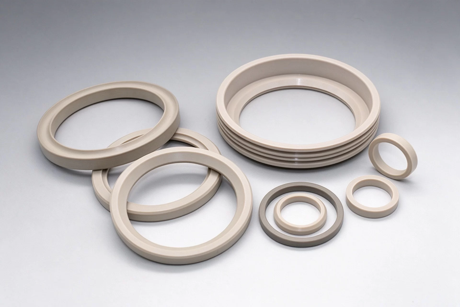 PEEK Seal Rings and Wear Washer Set Precision turned natural PEEK seal rings and wear washers for propulsion mechanical systems